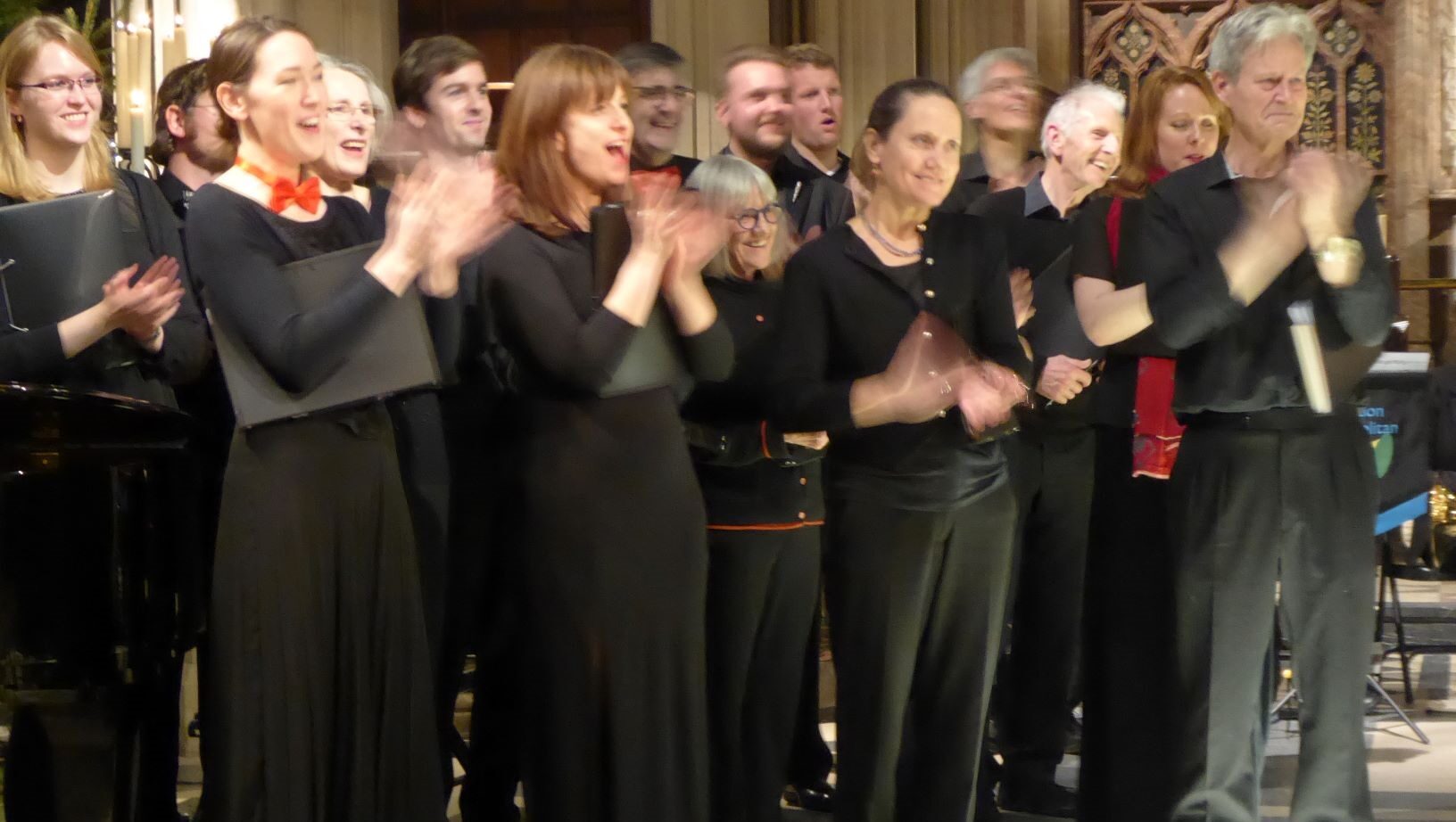 The choir applauding